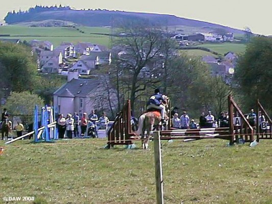 Horse Jumping with a view over to the Neilston Pad, 1999 Show

