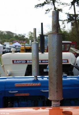 2009, stacks in a row
Whether its hay stacks or tractor stacks, they have to be in a row.
