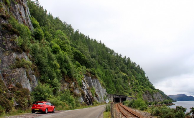 The A890 avalanche shelter
An unusual feature on a road in the UK, I can't think on any other road that has one.  Its only about 100m long and covers the single track road and the railway line.  This road has been troubled with land slips for many years due to the rock cuttings along the left side at this point.  [url=http://streetmap.co.uk/map.srf?X=191438&Y=837880&A=Y&Z=120/] Map location. [/url]
