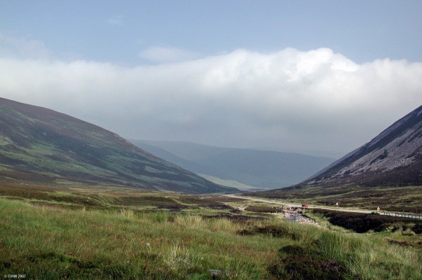 A93 Cairnwell pass
This view is taken just north of the Glenshee ski resort.  The Cairnwell pass is the Highest public road in the British Isles reaching a height of 2199ft above sea level.  There's no feeling of great height though since there are higher mountains on either side of the road, but the snow poles are there for a reason.  [url=www.multimap.com/map/browse.cgi?lat=56.9089&lon=-3.4066&scale=10000&icon=x/]Map location[/url]

