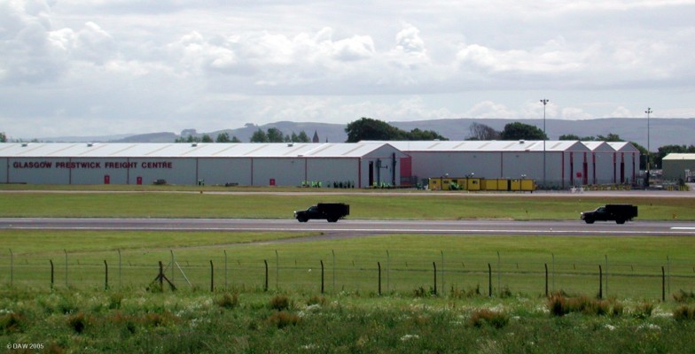 Air Force One runway escort
Air Force One gets an escort of 2 US pickups on the runway at Prestwick.  It was the only aircraft that didn't have to wait before taxi-ing to its stand, it also got a Fire Engine and all the traffic in Monkton was stopped..... thats obviously what the "special relationship" means, we'll do anyhing you want George.

