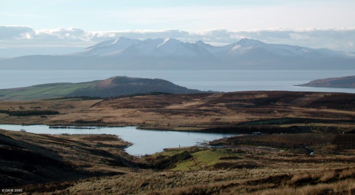 The Isle of Arran from Fairlie Moor
This winter view of Arran is taken from the Fairlie Moor road over looking the Fairlie Moor Trout Fishery on Glenurn Reservoir.  Behind that is Goldenberry Hill at Hunterston.  On the right of the photo Gull Point on the Little Cumbrae island can be seen.
