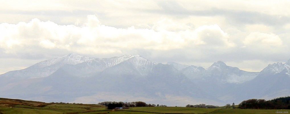 Arran over the Cumbrae
The view of Arran you get from Largs.  The top of the Great Cumbrae is visible along the foot of the picture.  [url=http://www.streetmap.co.uk/map.srf?X=221161&Y=658791&A=Y&Z=120/] Map location. [/url]
