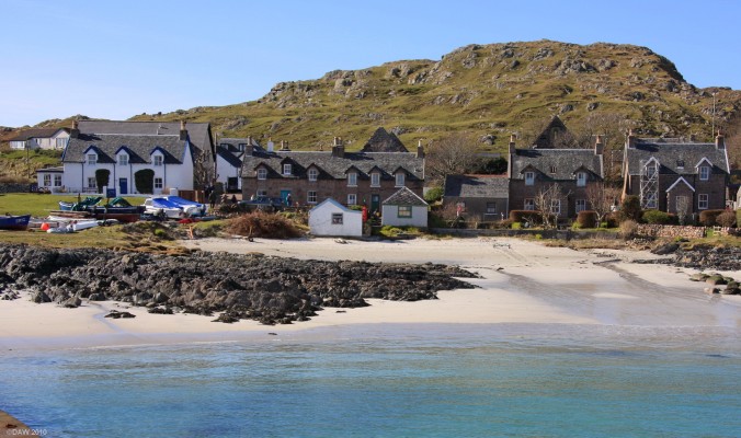 Baile Mor, Iona
The idyllic scene that you see as the ferry arrives at the Isle of Iona.  Baile Mor is the only settlement and is just a collections of houses and the odd shop.  The island is only about 3 miles long but does boast two hotels.  Despite its small size some 140,000 visitors make the crossing from Mull every year.  [url=http://www.streetmap.co.uk/map.srf?X=128672&Y=724005&A=Y&Z=120/] Map location. [/url]
