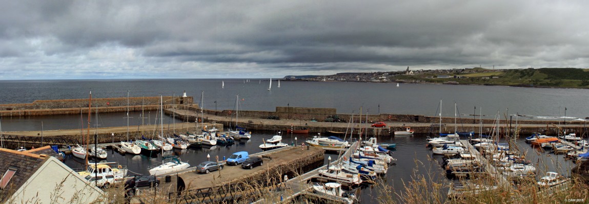 Banff Harbour
Looking over the harbour at Banff towards Macduff.  Banff and Macduff are separated by the River Devron, it wasn't until 1779 that a reliable bridge was built between the two settlements.  The harbour at Banff was built in 1775. [url=http://streetmap.co.uk/map.srf?X=368877&Y=864619&A=Y&Z=110/] Map location. [/url]

