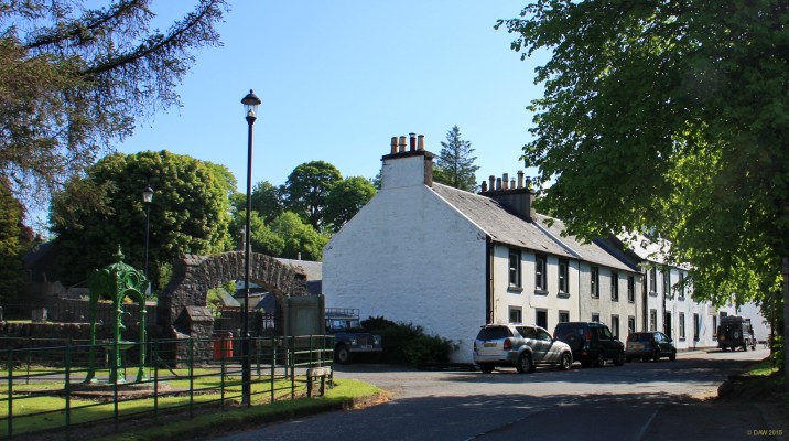 Barr, South Aytshire
Barr is a small village in deepest Ayrshire, you'll never pass through it unless you deliberately seek it out, its not on a main road to anywhere.  Its worth a visit though, it dates from the 17th century and is thought to have been established by smugglers who smuggled into secluded bays on the coast and then moved along the nearby 'raiders road'.  This view is looking along Stinchar Road with the fountain on the left. [url=http://streetmap.co.uk/map.srf?X=227552&Y=594061&A=Y&Z=115/] Map location. [/url]
