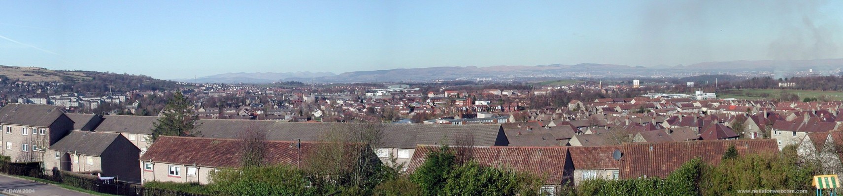 Auchenback Panorama
Lower Auchenback in in the foreground. Almost all of Barrhead is in the field of view with Cowan park playing fields on the right and the Fereneze hills on the left.  Glasgow and Paisley can be seen in the far distance.
