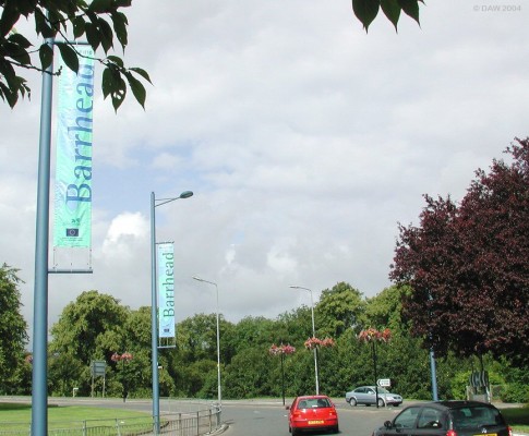 Barrhead, Barrhead, so good they named it twice!
Hanging baskets with flowers in Barrhead?  Surely some mistake?   Dovecotehall Roundabout, July 2004
