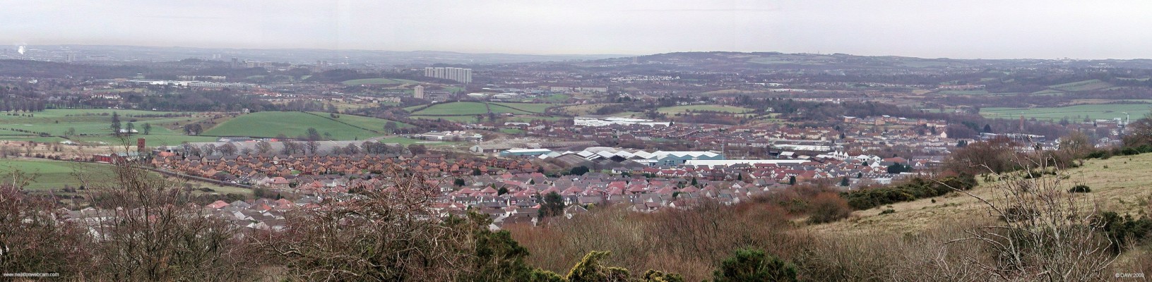 Barrhead panorama from Brownside Braes
Over looking Barrhead on a bleak, cold winter day.  On the extreme left is the fire station.  To the right of that there is still the remains of the old Armatage Shanks factory that played a large part in the history of Barrhead.    On the extreme right is the Barrhead High and the spire to St Johns Church.  [url=http://www.streetmap.co.uk/map.srf?X=248770&Y=660170&A=Y&Z=115/] Map location. [/url]
