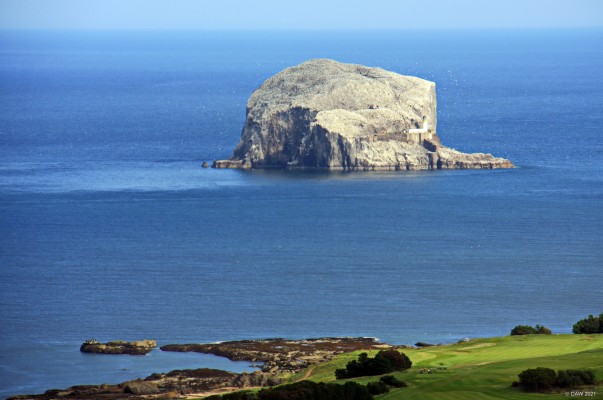 The Bass Rock from Berwick Law
Looking out to the Bass Rock from the top of Berwick Law.  The white you see is caused by a large Gannet colony.  [url=http://streetmap.co.uk/map?X=355775&Y=684070&A=Y&Z=126/] Map location. [/url]

