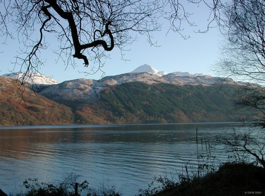 Loch Lomond and Ben Lomond in the distance
A view from the western shore of Loch Lomond with a snow capped Ben Lomond rising to 974m in the distance.  Loch Lomond is the largest expanse of fresh water in the British Isles.
