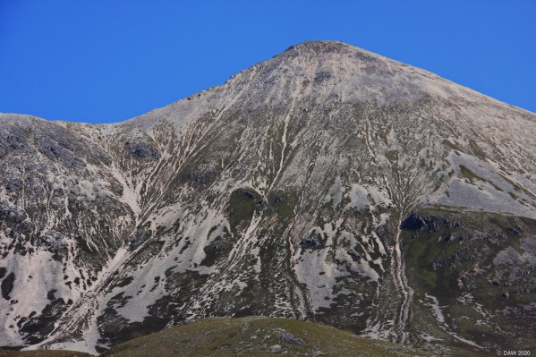 Beinn Eighe, Glen Torridon
Part of the Torridon mountain range.   This peak is particularly striking due to the white coloured rock that comes from quartzite contained in the them. [url=www.multimap.com/map/browse.cgi?lat=57.5551&lon=-5.415&scale=25000&icon=x/]Map location[/url]
