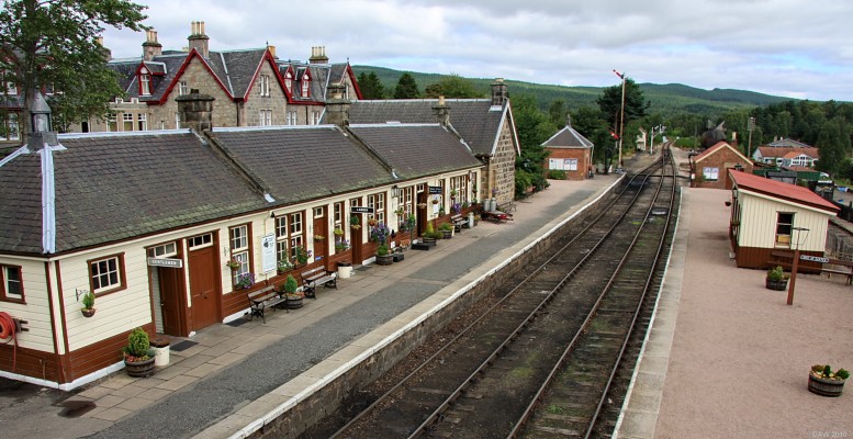 Boat of Garten Railway Station
Over looking Boat of Garten Railway station, now part of the [url=http://www.strathspeyrailway.net/home.html/] Strathspey Railway. [/url]  The line was opened in 1863 but closed in 1968.  In 1971 the Strathspey railway company was formed and they bought the Aviemore to Grantown line from British Rail.  Boat of Garton station was still intact at the time.  Today steam trains run from Aviemore to Broomhill during the summer months.
