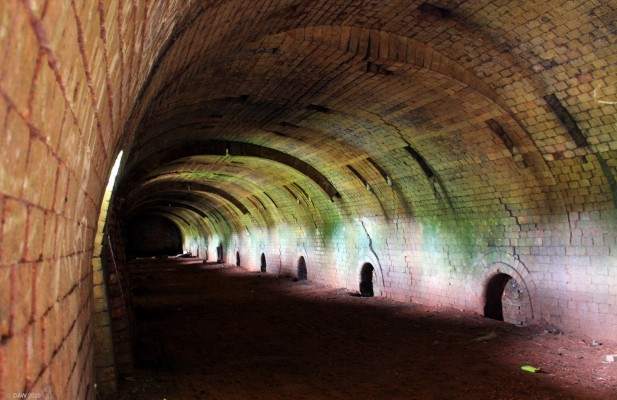 The Brick Kiln, Dunaskin
Inside the brick kiln at the former Dunaskin Brickworks.  It dates from around 1930 and replaced an earlier mid 19th century kiln.  The Brickworks were built on the former site of the Dalmellington Ironworks at Dunaskin and used the two chimneys from that works that still stand today.[url=http://streetmap.co.uk/map.srf?X=244272&Y=608353&A=Y&Z=115/] Map location. [/url]
