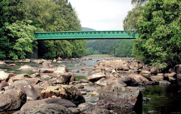 Bridge at Crathie, Royal Deeside
The Bridge across the River Dee at Crathie.   Built in 1857, it was designed by one of Brtain's greatest engineers, Isambard Kingdom Brunel.  The Bridge was commissioned by Prince Albert after Queen Victoria and Prince Albert bought Balmoral Castle which sits beyond the bridge on the left hand side out of sight in the trees. [url=www.multimap.com/map/browse.cgi?lat=57.039&lon=-3.2162&scale=25000&icon=x/]Map location[/url]
