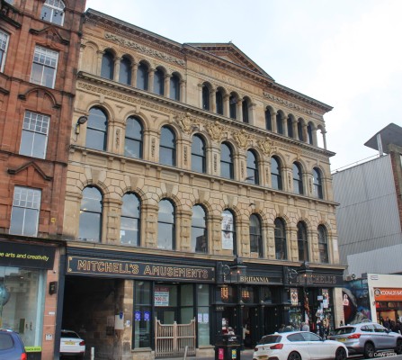 Britannia Panoptican Music Hall building, Glasgow, 2018
Built in 1857, the date is carved in stone at the top of the building.  Today the secret of what lies within is well hidden.  It is the oldest intact music hall left in the UK.   When in use it  had a central entrance where the amusement shop is now.  The building is catagory A listed and the music hall is in the hands of a [url=http://www.britanniapanopticon.org/] trust. [/url].  [url=http://www.streetmap.co.uk/map.srf?X=259412&Y=664954&A=Y&Z=110/] Map location. [/url]
