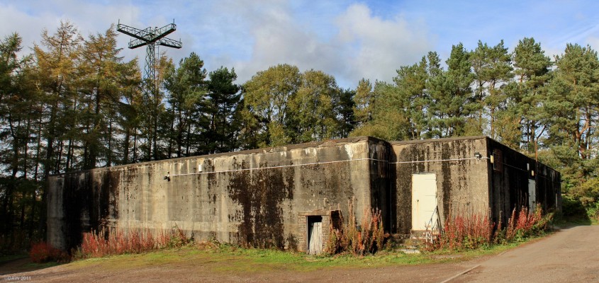 Former AAOR Bunker, Torrance House, Calderglen
Built in the 1950's near Torrance House as a control centre for Cold War anti-aircraft defences.  In the 1960's it became a regional control centre, a regional seat of government with fire, police, military and health communications for use in the event of a Nuclear attack.  It consists of two floors with its own generator and air filtering unit.  Unusually the original aerial is still standing behind, even though the building has been used by the parks department at Calderglen since about 1993.
