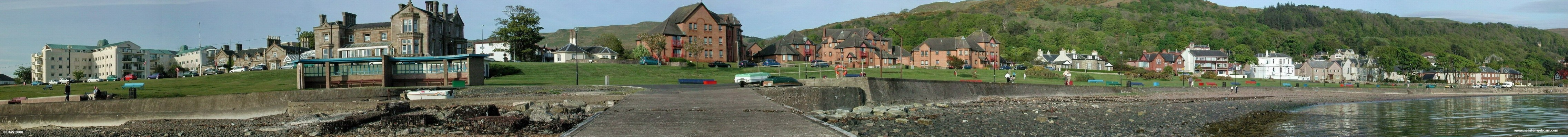 Castle Bay, Largs, 2005
The evening sun shines on a spring evening at Castle Bay Largs.  This photo was taken from the old Yacht club jetti.  The stone building on the left is what was the Priory Hotel, it has now gone the way of most other hotels in Largs and is being converted into flats.  The red flats to the right is where the Marine & Curling Hall Hotel once stood.  [url=http://www.streetmap.co.uk/streetmap.dll?G2M?X=220325&Y=658630&A=Y&Z=3/]Map location[/url]
