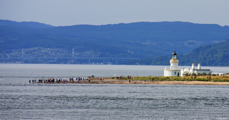 Chanonry Point, Moray Firth
A view of Chanonry Pint from Fort George.  The reason there are lots of people is because this is one of the best spots in the Moray Firth to see Dolphins close the shore when the tide turns. [url=https://streetmap.co.uk/map.srf?X=276020&Y=856632&A=Y&Z=120/] Map location. [/url]

