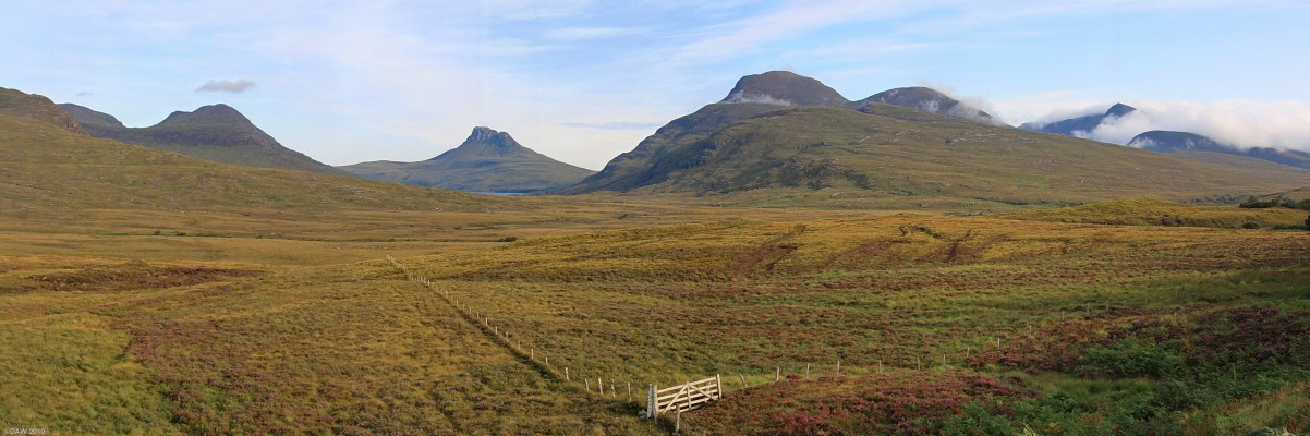 A view of the Coigath area north of Ullapool
Early morning mist clears from Cul Beg (769m) and Cul Mor (849m) on the right hand side.  Just left of centre in the distance is Stac Pollaidh rising to some 612 metres.  [url=http://www.streetmap.co.uk/map.srf?X=215707&Y=903575&A=Y&Z=120/] Map location. [/url]
