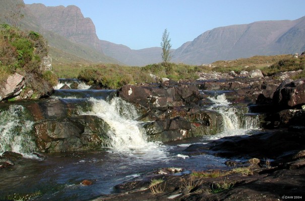 Coire nan Arr
A view from the Applecross road where it crosses Russel Burn.   Looking up towards the head of Coire nan Arr with the rugged Applecross mountains all around.

