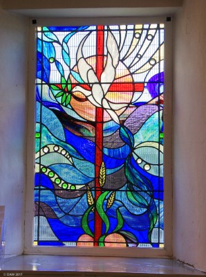 Stained glass window, Neilston Parish Church
One of the two windows  commissioned by the 1st Neilston Boys Brigade Company as a celebration of their 50th Anniversary in 2011.  This one represents Community" and was designed by Elizabeth Skea.  

