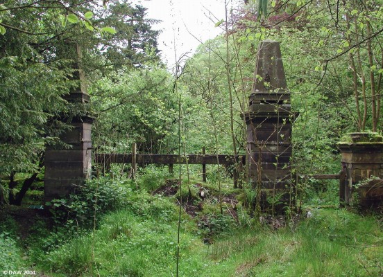 Cowden Hall Gateway
Cowden Hall was built in 1860 by Robert Orr, the owner of Crofthead Mill. It was an impressive building with servants quarters in the basement, large grounds, tennis courts and a walled garden, These stone gateposts are one of few outward signs that something used to be there. Thanks to Tom McKendrick for updating this photo by removing the graffiti.
