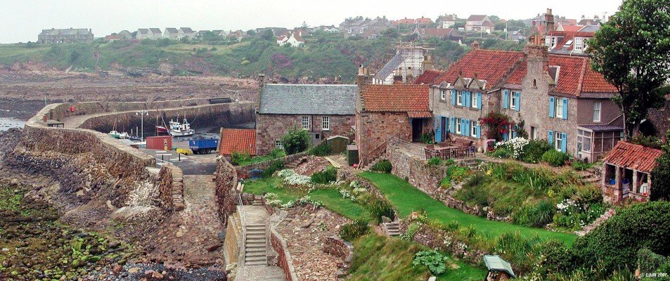 Crail, East Nuek of Fife
Crail is a small fishing village just south of St Andrews.  The curved break water that creates the harbour dates from the 16th century. [url=http://www.multimap.com/map/browse.cgi?lat=56.2588&lon=-2.6243&scale=10000&icon=x/]Map location[/url]

