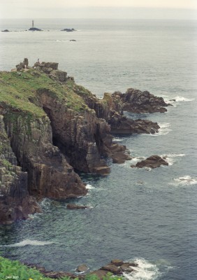 Dr Syntax's Head, Land's End, England, 1991
This is the most Westerly promintary of mainland England.  The rather odd name is from an invented name by the writer William Crombe and comes from his comic verse of 1809.  The lighthouse you see off shore is the Longhouse Light dating from 1869 and still in use today after having been automated in 1988.
