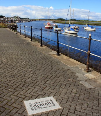 Irvine harbourside
The paving stone contains old Scots words describing weather, far be it from me to suggest I've experienced all these in Irvine.  [url=http://streetmap.co.uk/map.srf?X=231182&Y=638318&A=Y&Z=115/] Map location. [/url]
