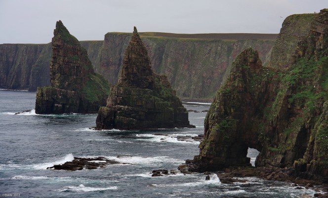 The Sea stacks at Duncansby Head, Caithness
A view of the two stacks at Duncansby head and also the Sea Arch, Thirle Door, on the left.  [url=http://www.streetmap.co.uk/map.srf?X=340373&Y=972792&A=Y&Z=115/] Map location. [/url]
