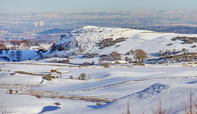 Duncarnock Hill in winter
Locally known as 'The Craigie' seen from the Neilston Pad.  A snow covered Walton Dam is on the right.  With a bit of imagination (actually quite a lot) you can just about see the line of the enclosure around the top of the hill that once made this an Iron Age fort. [url=http://www.streetmap.co.uk/map.srf?X=248775&Y=655000&A=Y&Z=120&ax=247770&ay=655220/] Map location. [/url]
