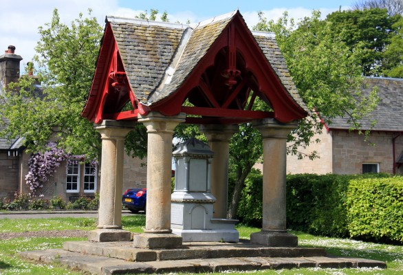 The Well, Dunmore Village
Dunmore is a very small planned village built by Catherine Herbert, widow of the 6th Earl of Dunmore to improving the housing for the estate workers.  It has the appearance of an English style village green surrounded by the cottages.  The cottages, a school and the well pictured here were all completed by 1879. [url=http://streetmap.co.uk/map.srf?X=289361&Y=689422&A=Y&Z=115/] Map location. [/url]
