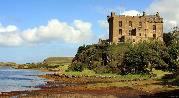 Dunvegan Castle, Loch Dunvegan
A view of [url=http://www.dunvegancastle.com/content/default.asp/] Dunvegan Castle [/url] from the south.  Standing on a high rocky outcrop its clear to see why this was such a good stronghold for the Clan Chief of the Macleod's for 800 years.  It was once surrounded by water and also had its own fresh water well. 
