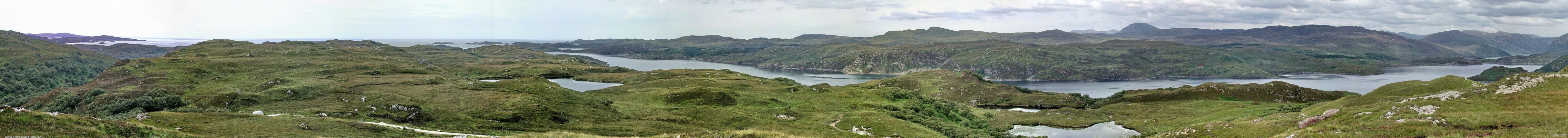Panoramic view over looking Eddrachillis Bay
Loch a Chairn Bhain is on the right with the Kylesku Bridge in the distance on the extreme right.  On the extreme left of the picture is Oldany Island.  [url=http://www.multimap.com/map/browse.cgi?lat=58.2483&lon=-5.0858&scale=25000&icon=x/]Map location[/url]

