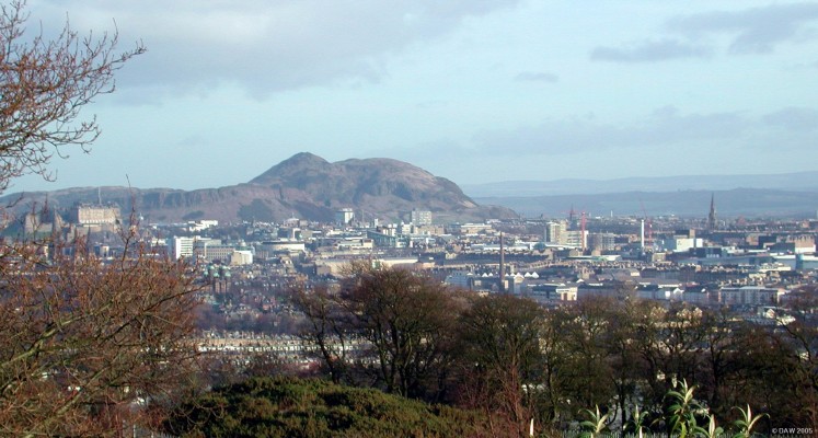 Overlooking Edinburgh City towards Arthur's seat
This is the view from the top of Edinburgh Zoo.  On the left behind the tree the Castle can be seen.  The centre of the picture is dominated by the 250m high Arthur's Seat.  The hill is the basalt lava plug from an extinct volcano that was active some 335 million years ago. [url=http://www.multimap.com/map/browse.cgi?lat=55.9510&lon=-3.2700&scale=25000&icon=x/]Map Location[/url]
