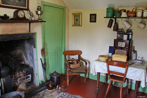 Inside the farm steading cottage, Highland Folk Museum
The cottage consists of only three rooms, this is the main living room which had a bed in a recess and an area for cooking.  The time period for how it looks is the 1930's.
