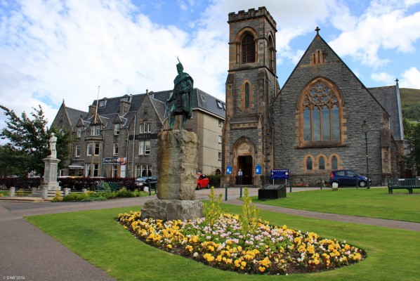 Fort William
If you walk to the end of the high street you get to the this public area.  The statue in the foreground is of Donald Cameron, the 24th chief of Clan Cameron.  To the left is the war memorial, the Church is the Duncansburgh Macintosh Parish Church and dates from 1882.  It is built from Ballachulish granite faced free stone. [url=http://www.streetmap.co.uk/map.srf?X=210342&Y=773993&A=Y&Z=106&ax=210400&ay=774077/] Map location. [/url]
