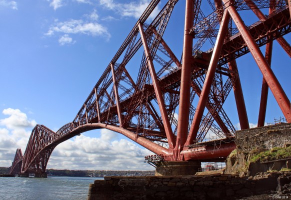 The Forth Bridge
Opened in 1890 and still in use today it carries two railway tracks the 1.5 miles across the River Forth using three massive cantilever structures.  55,000 tons of steel were used in its construction and it cost the lives of 57 workers.  This view is taken from North Queensferry looking south.

