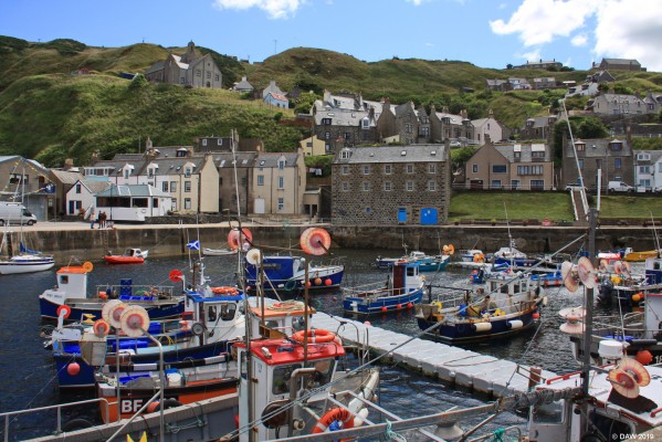 Gardenstown Harbour, Aberdeenshire
Gardenstown was originally known as Garnie but in 1720 Alexander Garden founded Gardenstown as a fishing village,  There were 250 fishermen and 50 boats between here and Crovie just along the coast.  [url=http://streetmap.co.uk/map.srf?X=379907&Y=864847&A=Y&Z=115/] Map location. [/url]
