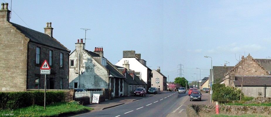 Gateside, near Beith
A small rural community that only has 2 streets and a few dozan houses.  Despite its small size it can boast its own village hall (on the right), a school and a pub.  Unlike some other similar sized villages it has managed to resist significant new housing development over the years.  [url=http://www.multimap.com/map/browse.cgi?lat=55.7483&lon=-4.6054&scale=25000&icon=x/]Map location[/url]
