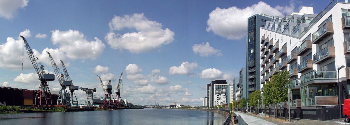 Glasgow Harbour Development, Upper Clyde
Taken in 2007, these flats stand where the old Granary building was.  The tallest building here is probably about the same height.  There's a joke going round that says a new resident phoned across to the ship yard to ask when it was closing because the estate agent had said it was going close soon before they bought the flat.  The ship under construction is HMS Diamond, one of 6 type 45 Air Warfare destroyers being built for the Royal Navy.  
