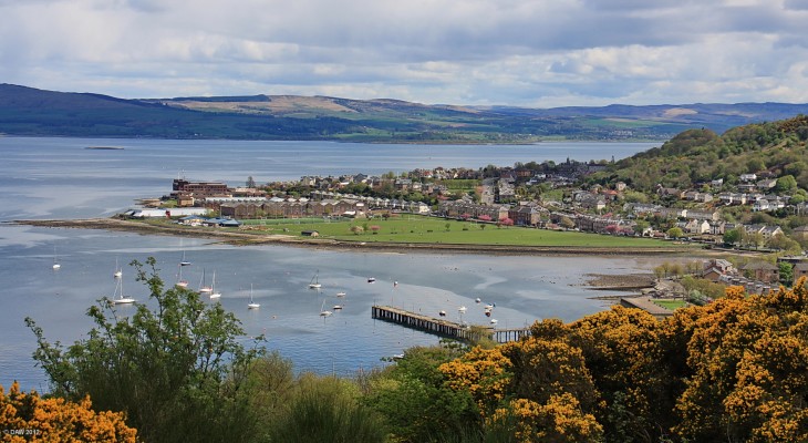 Gourock Bay
Overlooking Gourock Bay from Tower Hill.  Battery Park is in the centre of the photo, formed from landfill when the railway was constructed.  It gets its name from the fact that in the 18th century there was a gun battery called Fort Matilda nearby, that site is today occupied by HM Coastguard.  The buildings of the former Torpedo factory, now warehouses are immediately behind the park.  In the distance you can see the wreck of MV Captayannis which capsized in 1974.

