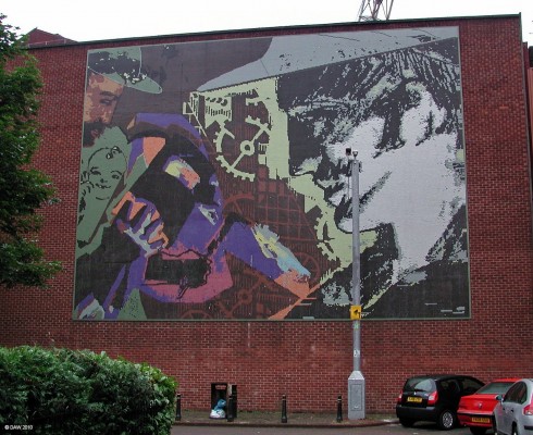 Mural, Govan
You could easily think you have stepped back in time to the Soviet Union when you first see this Mural in a side street in Govan.  Made from 1" square mosaic it brightens up the blank shipyard wall.  The street camera spoils it a bit but that came later.
