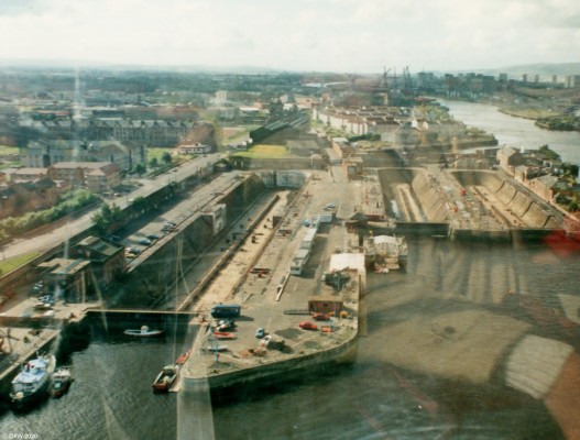 Govan Graving Docks, 1988
This view of the old Graving Docks was taken from the Clydesdale Bank Tower at the Glasgow Garden Festival in 1988.  today those docks have been completely abadoned and are water filled.  The site was recently used to shoot one scene in the film "1917".  Unfortunately the photograph was taken through glass so the reflections spoil it a bit.

