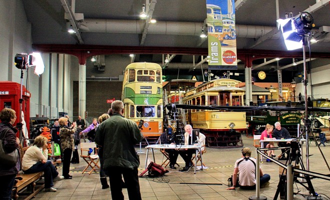 Filming of 'The Great British Home Movie Roadshow', Glasgow Museum of Transport
Dan Cruikshank talking to a guest about a home movie.  Filmed in March 2010 for BBC2 to be shown in August 2010.  This was the last week the old Transport Museum at Kelvin hall was open to the public before the big move to Yorkhill.
