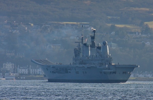HMS Ark Royal, Clyde 2010
Taken from Kilcreggan looking over towards Gourock early in 2010.  Just over a year later Ark Royal was decomissioned.  This view shows the ramped flight deck allowing the Harrier Jets to carry a heavier payload than if they were to launch vertically.  [url=http://www.streetmap.co.uk/map.srf?X=223697&Y=680332&A=Y&Z=120/] Map location. [/url]
