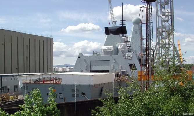 Stern view of HMS Daring, BAE Systems Scotstoun
Taken in may 2007 when D32 was still fitting out.  She was handed over to the Royal Navy in late 2008.  She won't be fully operation until around 2012 since its main weapon system, the PAAMS/Sea Viper air defence system won't be fully tested until then.  Meanwhile, the Royal Navy has a very large and expensive Gin palace with a 4 inch gun at the bow to go cruises with.
