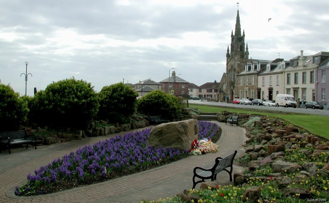 HMS Dasher memorial, Ardrossan, Ayrshire
This boat shaped flowerbed on the seafront at Ardrossan commemorates the 379 men who lost their lives on the 23rd of March 1943 when the light escort carrier HMS Dasher blew up and sank south of the wee Cumbrae in the Firth of Clyde.  Due to the war there was much secrecy about the incident and even today the exact cause of the explosion is not fully understood.  The wreck still lies in 131m of water where it sank and is now considered a war grave.
