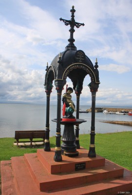 Harbour street drinking fountain, Portmahomack
The fountain was erected to celebrate the arrival of piped drinking water to the town in 1887. It was presented by Peter MacDonald, a native of Portmahomack and a "rectifier and wine merchant" in Glasgow. It was opened in 1892 with full Masonic honours in front of a large crowd.  
